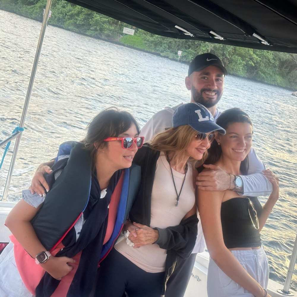 Family enjoying a yacht charter outing together on the water