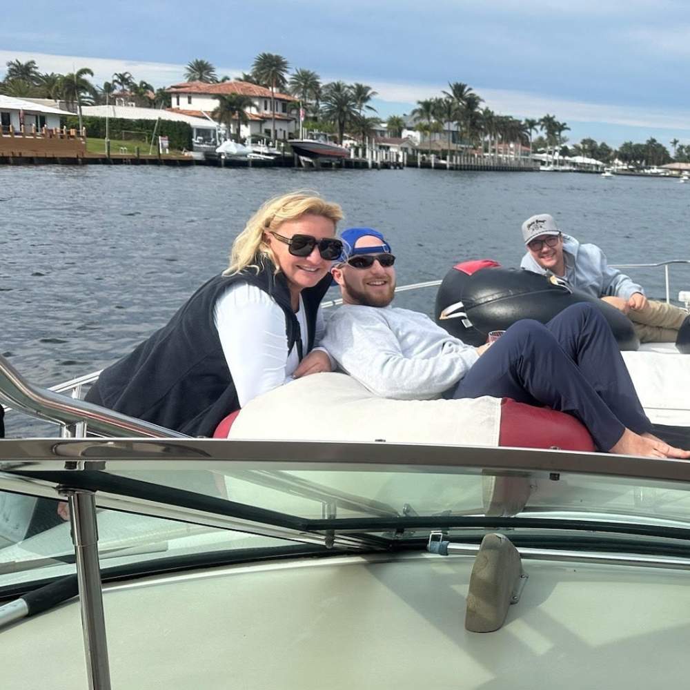 Guests relaxing and enjoying water activities at a laid-back yacht party in Pompano Beach
